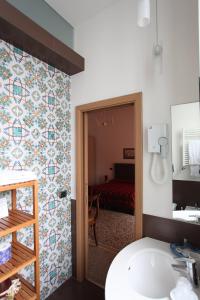 Posteľ alebo postele v izbe v ubytovaní B&B Orsini 46
