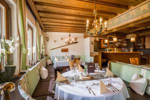 Posedenie v ubytovaní Hotel Pension Alpengruß