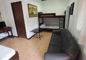 Dviaukštė lova arba lovos apgyvendinimo įstaigoje Balay Travel Lodge