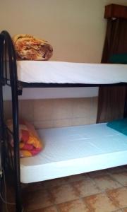 Bunk bed o mga bunk bed sa kuwarto sa Sleek Hostel