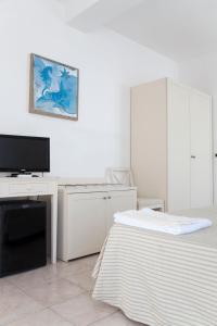 TV a/nebo společenská místnost v ubytování Hotel Amarea - Aeolian Charme