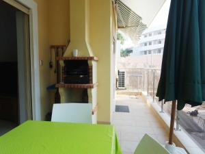 ラゴスにあるC05 - Convento Apartmentの緑のテーブルと椅子