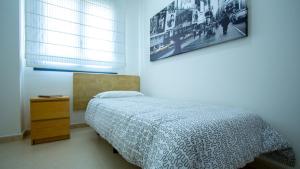 Кровать или кровати в номере Luxury apartment on Icod de los Vinos