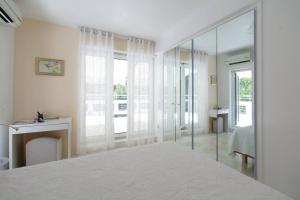 Fotografie z fotogalerie ubytování Sea View Dreamy Penthouse in Vouliagmeni v Aténách