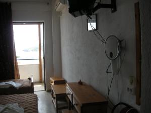 Voodi või voodid majutusasutuse Myrmidon Hotel toas