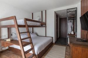 Postel nebo postele na pokoji v ubytování Plataran Bromo