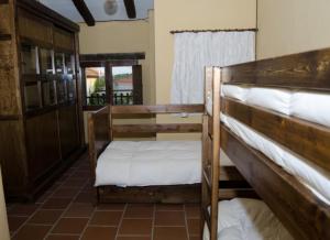 Krevet ili kreveti na kat u jedinici u objektu Casas rurales Santa Ana de la sierra