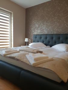 Postel nebo postele na pokoji v ubytování Hotel Pod Strzechą