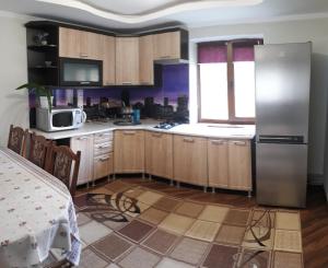 A kitchen or kitchenette at Emiliya
