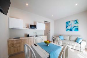 Kuchyň nebo kuchyňský kout v ubytování Apart-Hotel la Rocchetta