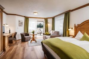 Postel nebo postele na pokoji v ubytování Hotel Haymon