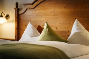 Postel nebo postele na pokoji v ubytování Hotel Haymon