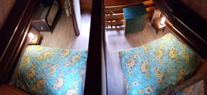 Ένα ή περισσότερα κρεβάτια σε δωμάτιο στο Chalet des plaines