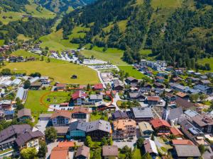 an aerial view of a small village in the mountains at Landhaus & Appartementhaus Haussteiner in Dorfgastein