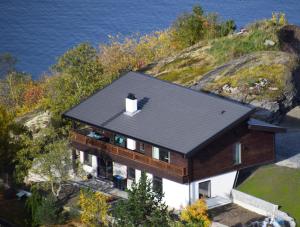 an aerial view of a house on an island at Otnes Sør in Aurland