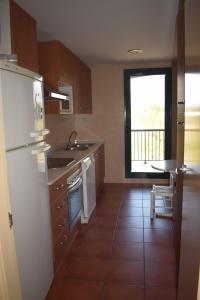 Kuchyňa alebo kuchynka v ubytovaní MSJ94 Bonito Apartamento en Marina Sant Jordi