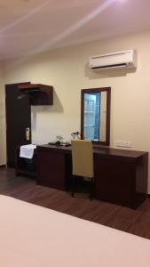 Kuchyň nebo kuchyňský kout v ubytování Cheng Ho Hotel