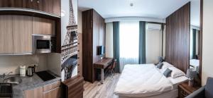 Posteľ alebo postele v izbe v ubytovaní Metropolis Apartamenty Centrum