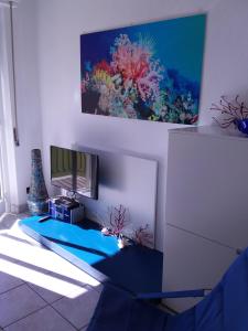A television and/or entertainment centre at appartamento Chiara