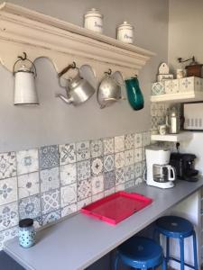 Cuisine ou kitchenette dans l'établissement Cosy Cottage