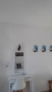 Fotografia z galérie ubytovania Pavlos Rooms v destinácii Livadia