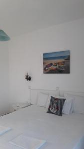 Posteľ alebo postele v izbe v ubytovaní Pavlos Rooms