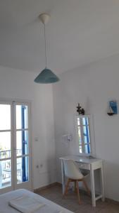 Posteľ alebo postele v izbe v ubytovaní Pavlos Rooms