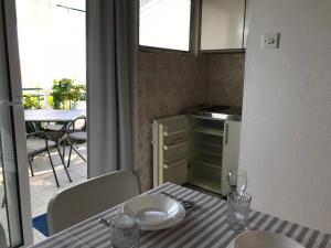 Kuchyň nebo kuchyňský kout v ubytování Apartmani Stula
