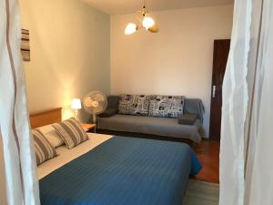 Postel nebo postele na pokoji v ubytování Apartmani Stula