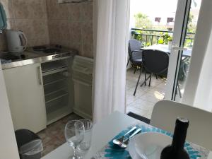 Kuchyň nebo kuchyňský kout v ubytování Apartmani Stula
