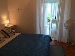 Postel nebo postele na pokoji v ubytování Apartmani Stula