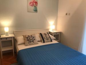 Postel nebo postele na pokoji v ubytování Apartmani Stula