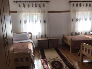 Voodi või voodid majutusasutuse Guest House Sabriu toas