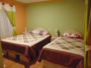 سرير أو أسرّة في غرفة في Eucalyptus Uyuni