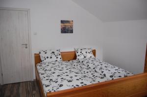 Postel nebo postele na pokoji v ubytování Vila Tadi
