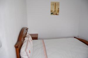 Postel nebo postele na pokoji v ubytování Vila Tadi