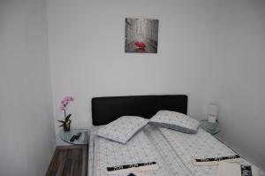 Postel nebo postele na pokoji v ubytování Vila Tadi