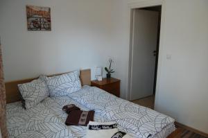 Postel nebo postele na pokoji v ubytování Vila Tadi