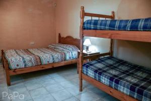 Una cama o camas cuchetas en una habitación  de Proyecto 44
