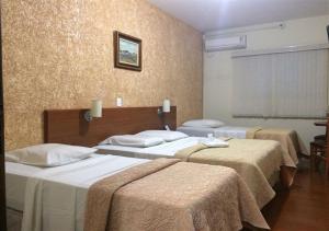 Postel nebo postele na pokoji v ubytování Hotel Rafeli