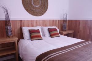 Cama o camas de una habitación en Hotel Aquaterra