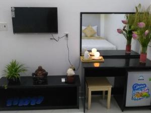 TV a/nebo společenská místnost v ubytování Phuc Hau Hotel