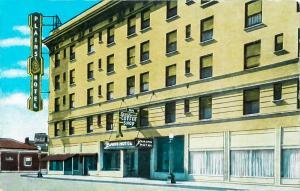 a large building on the corner of a street at Historic Plains Hotel in Cheyenne