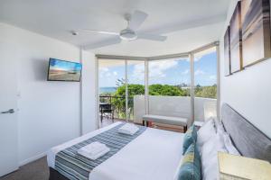 Cama o camas de una habitación en Sandcastles Mooloolaba