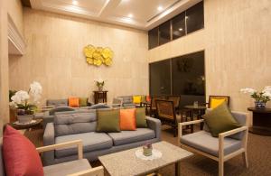 Phuket Merlin Hotel的休息区
