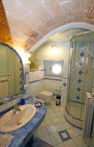 Ένα μπάνιο στο B&B Residenza Cardinale