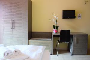 TV a/nebo společenská místnost v ubytování Hotel Kube