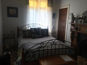 A bed or beds in a room at The Inn At The Convent