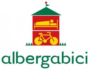a logo for analgaldo with a bike in it at Podere San Ferdinando in Arcidosso