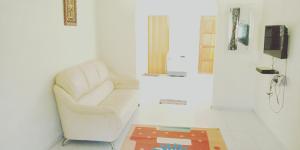 TV a/nebo společenská místnost v ubytování Sarifah homestay